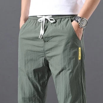 2022 קיץ גברים מכנסי ספורט חיצוניים מזדמנים מכנסיים צבע מוצק אלסטי המותניים קל משקל נוח זכר מכנסיים ארוכות בתוספת גודל